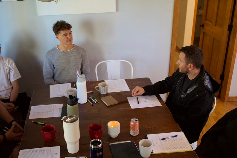 Savon and Cameron in a session at the retreat table