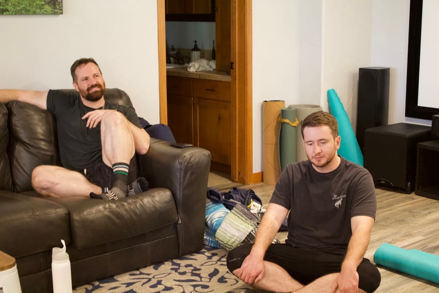 Two men resting between sessions